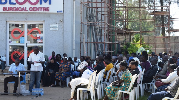 People wait at eye camp in eye camp organised by optometrist Kejal Shah